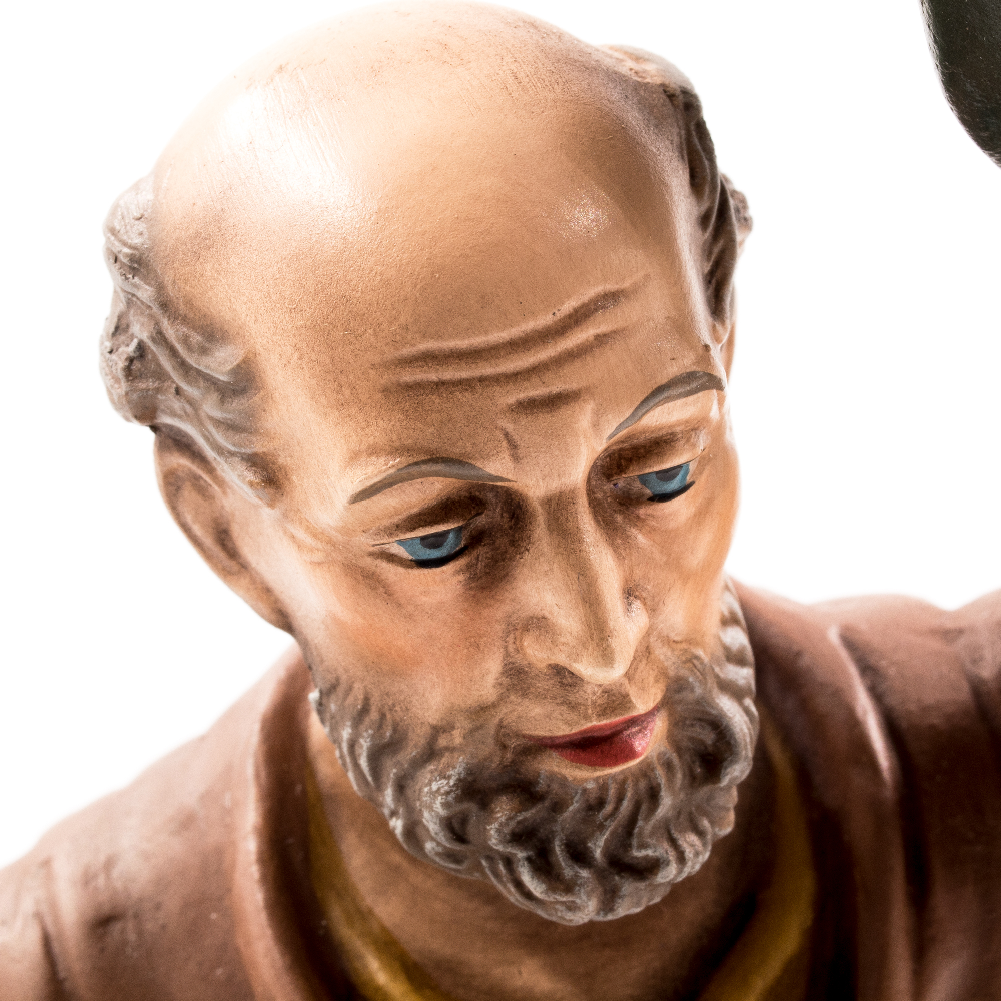 Detail einer bärtigen, handbemalten Krippenfigur