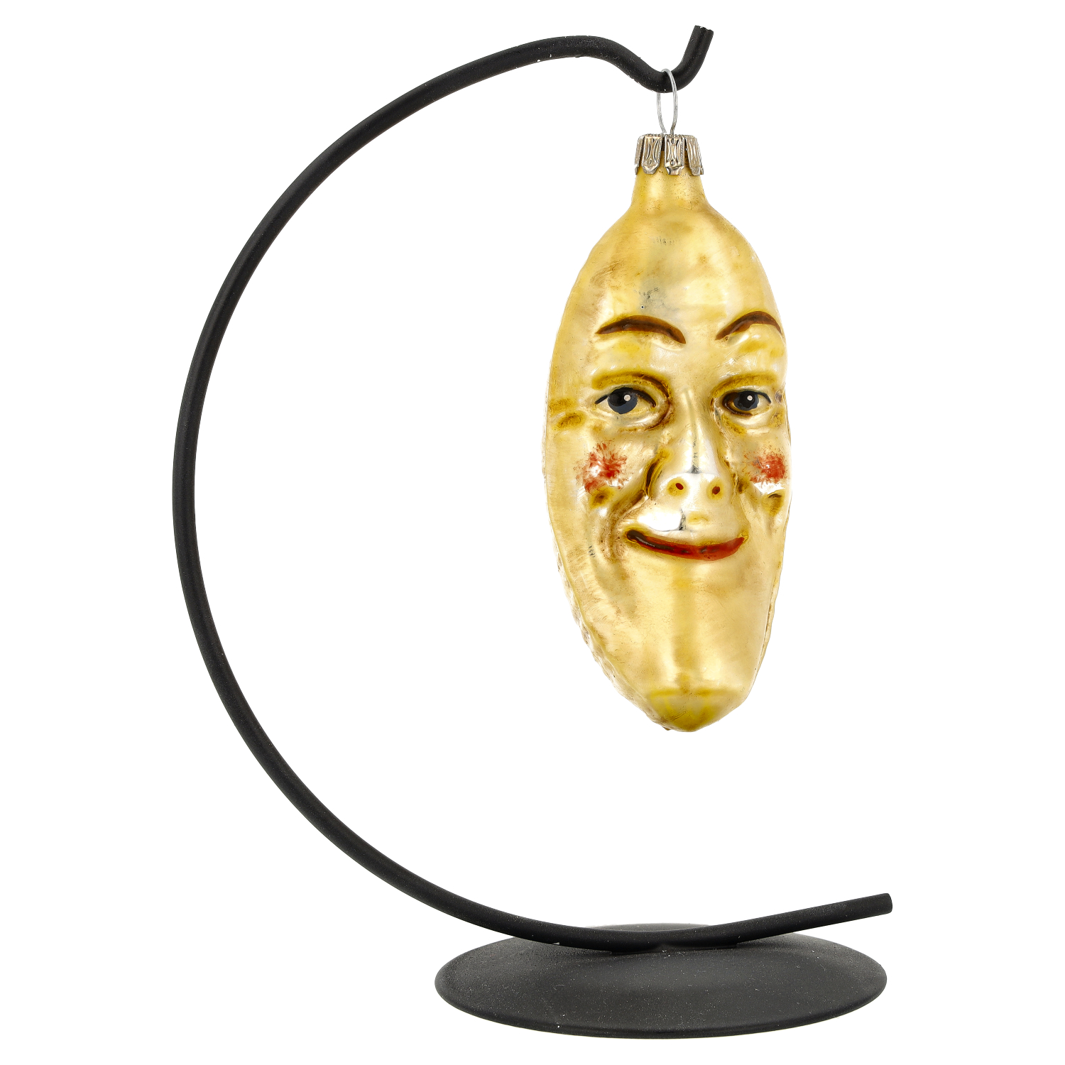 Goldenes Glas-Ornament mit Gesicht auf schwarzem Ständer