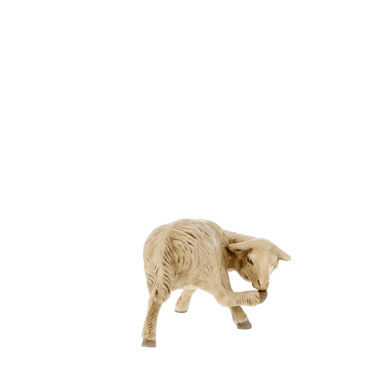 Lammfigur, leckt sein Bein, naturfarben