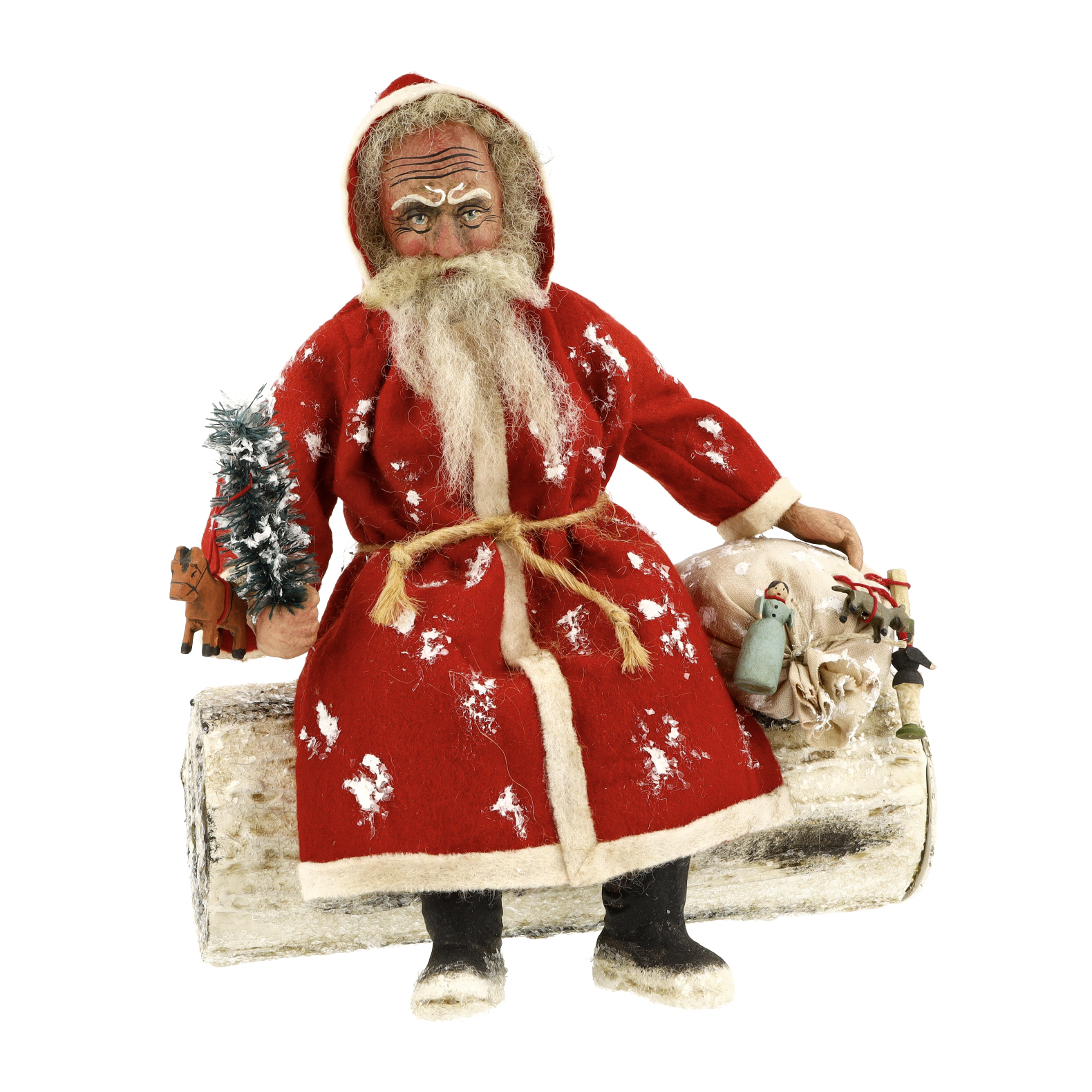 Deko Weihnachtsmann Figur mit Tanne und Spielzeug auf Stamm