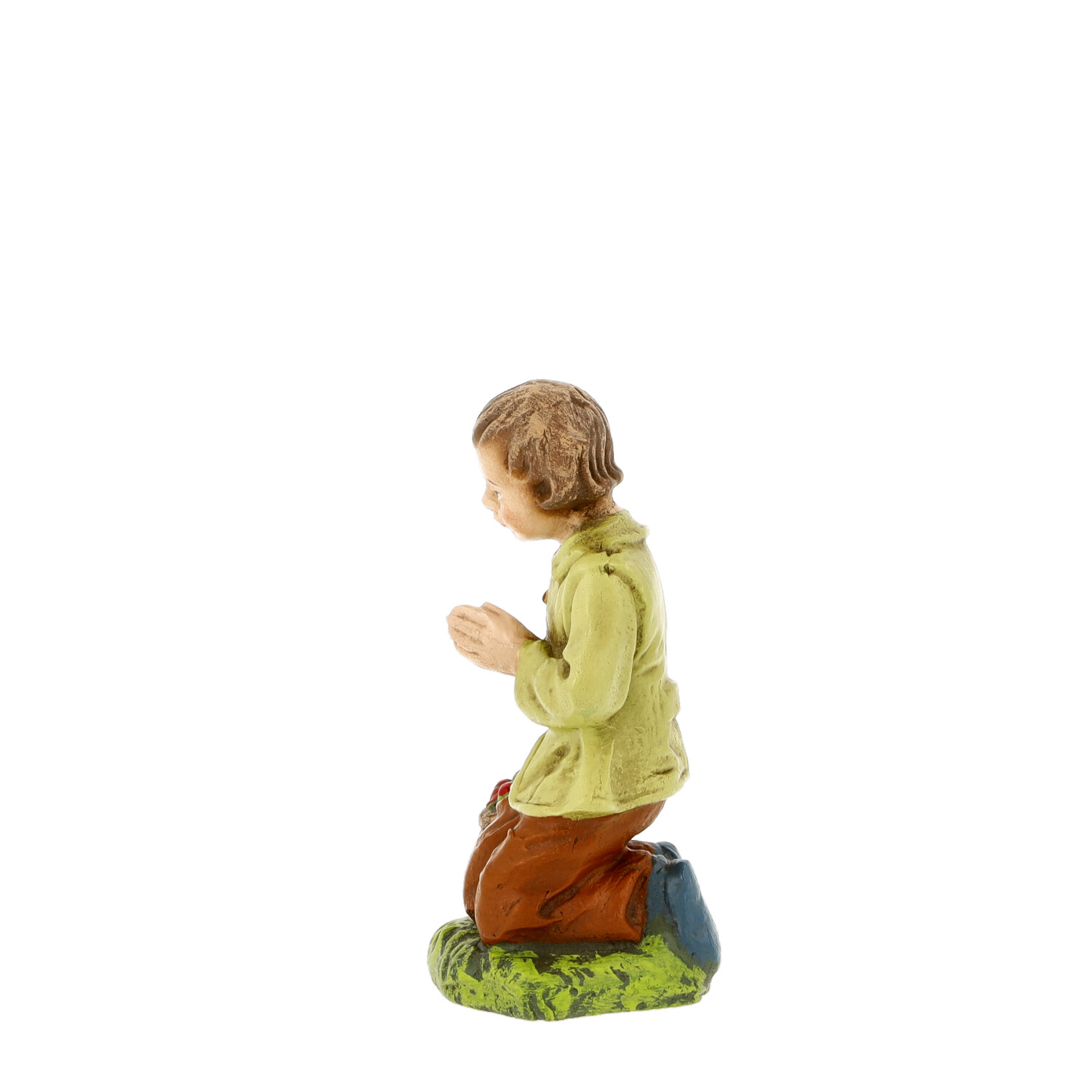 Kniende Krippenfigur, betendes Kind seitlich