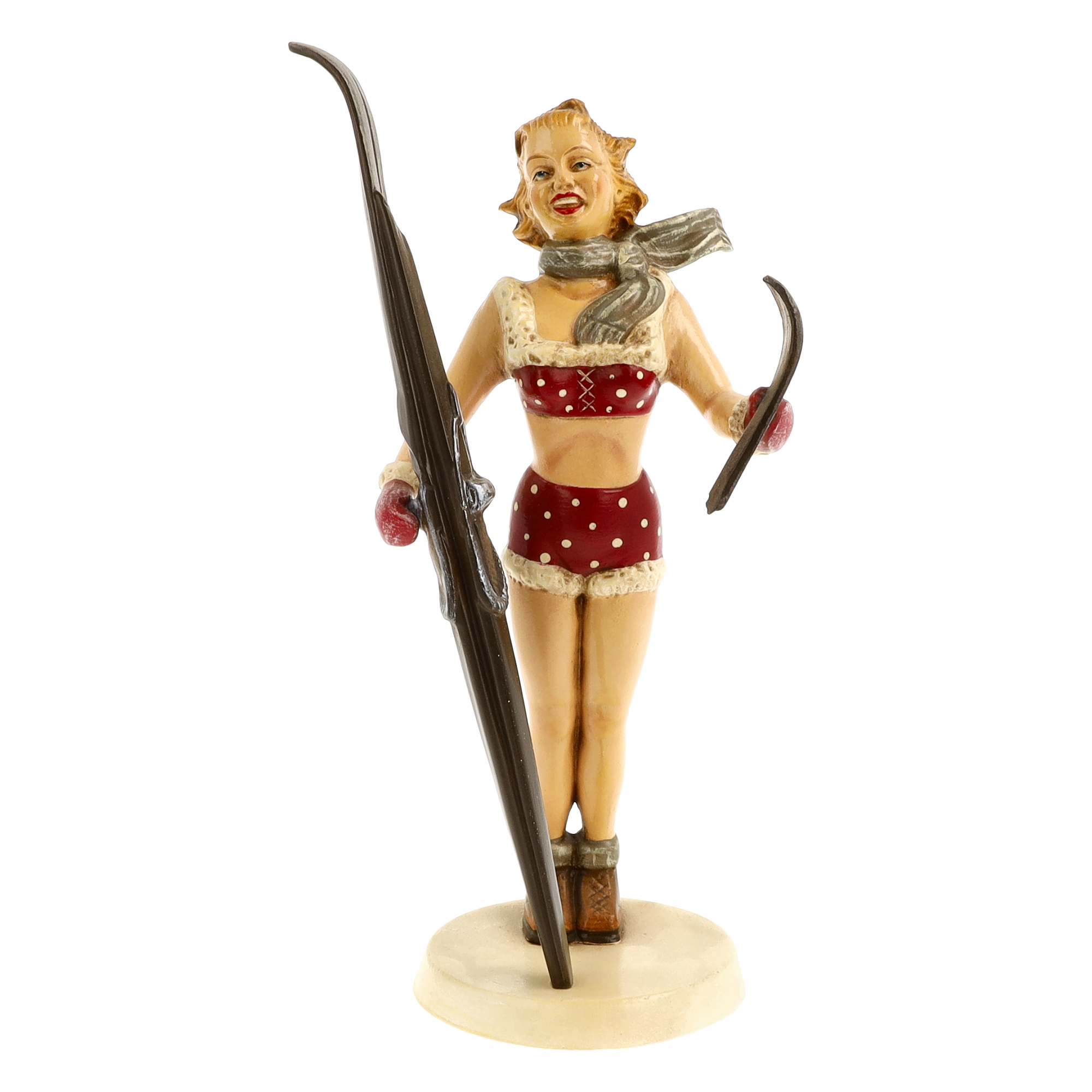 Retro Skifahrerin-Figur mit Ski, rot-weiß, auf Sockel
