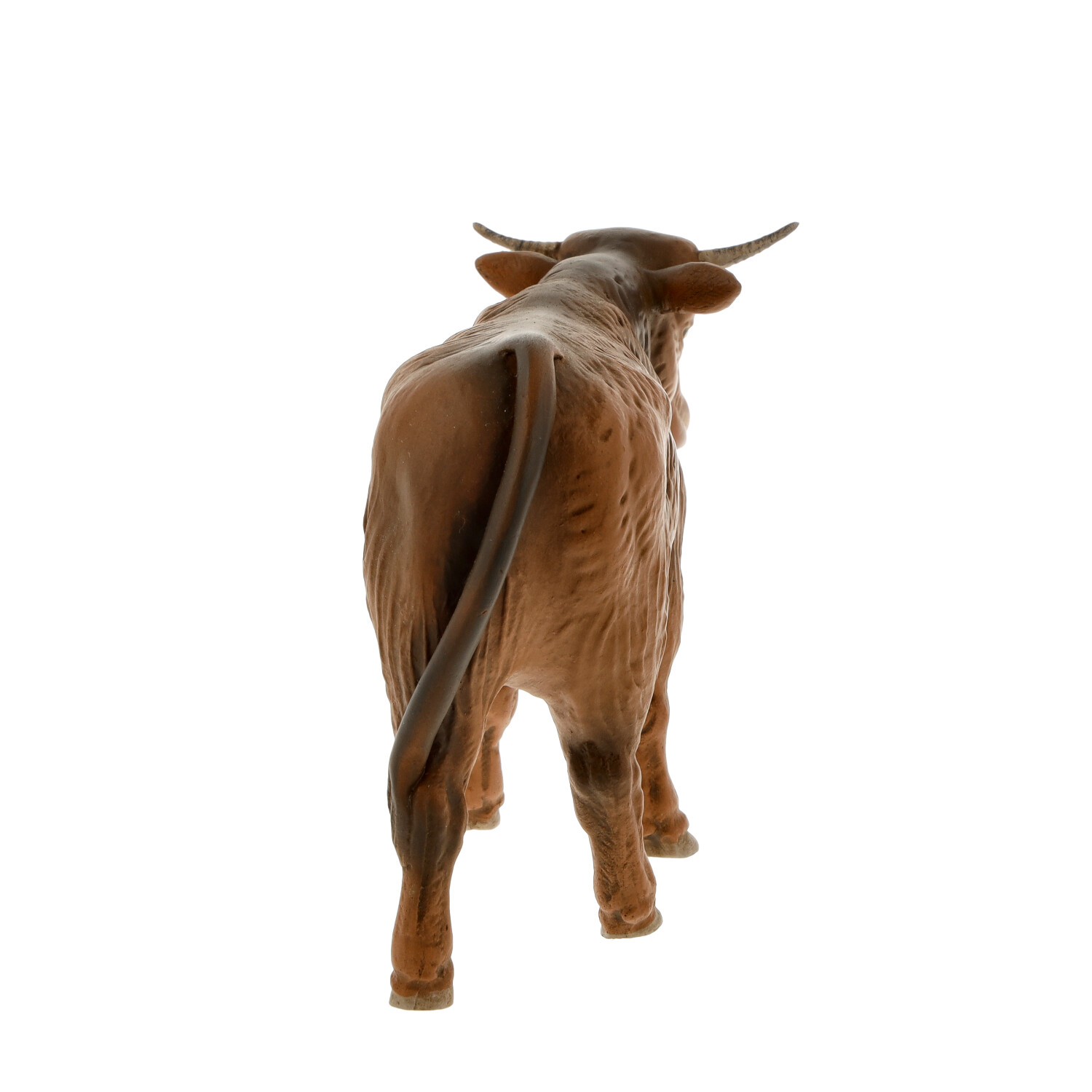 Braune Stier-Spielfigur von hinten auf Weiß