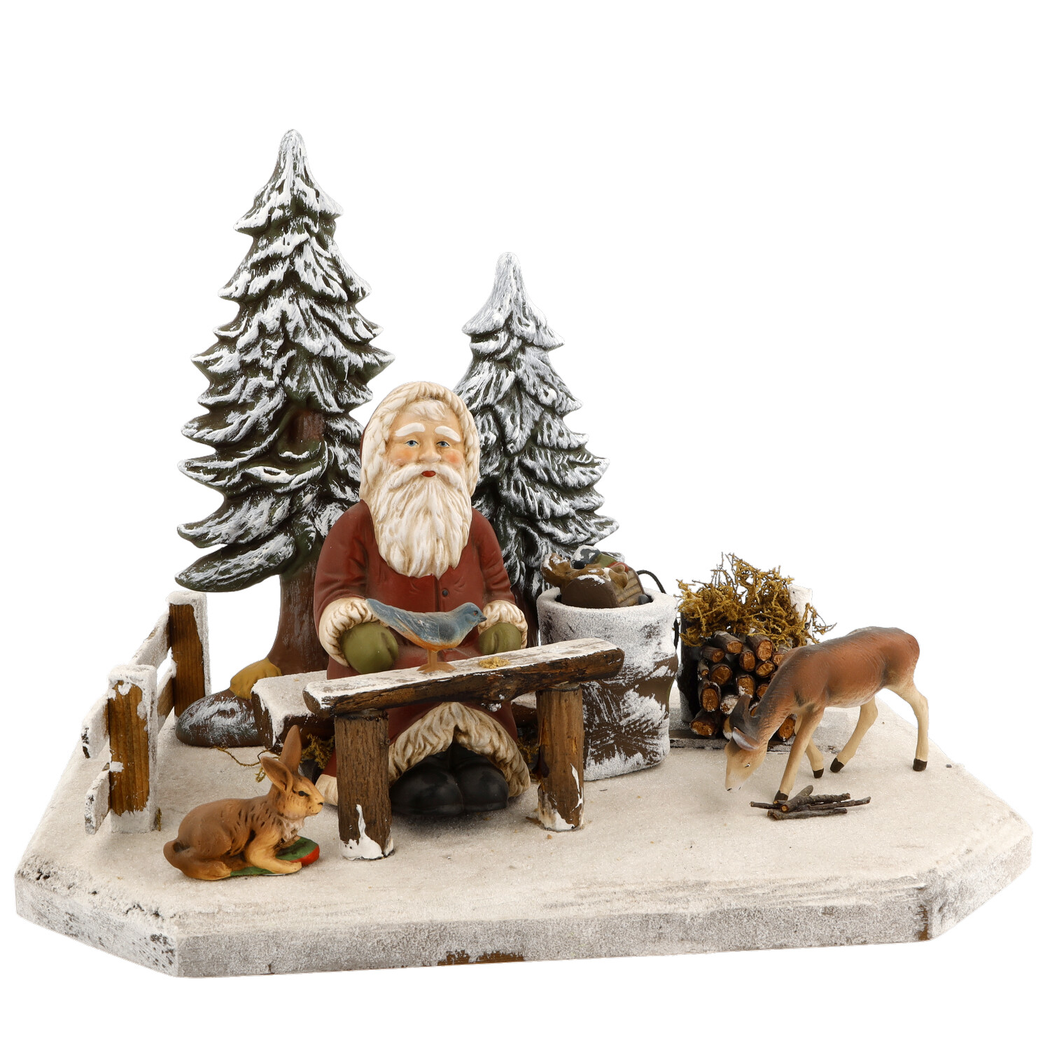 Weihnachtsszene: Figur mit Reh und Hase im Schnee