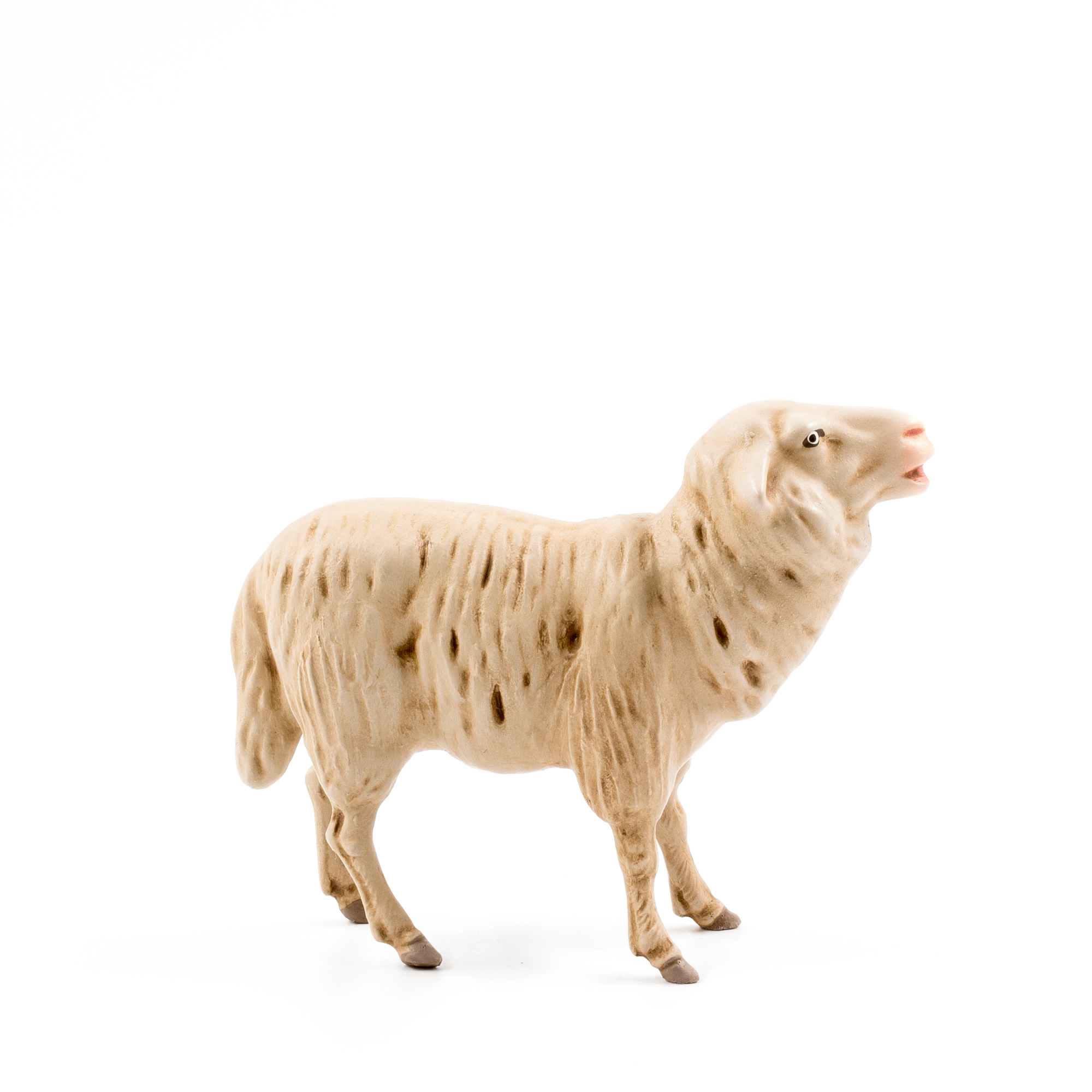 Beige Schaf-Spielfigur auf weißem Hintergrund