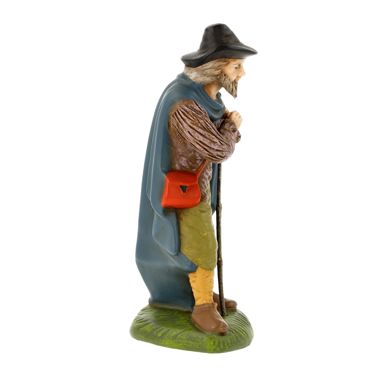 Hirtenfigur mit Mantel, Hut, Stock und roter Umhängetasche