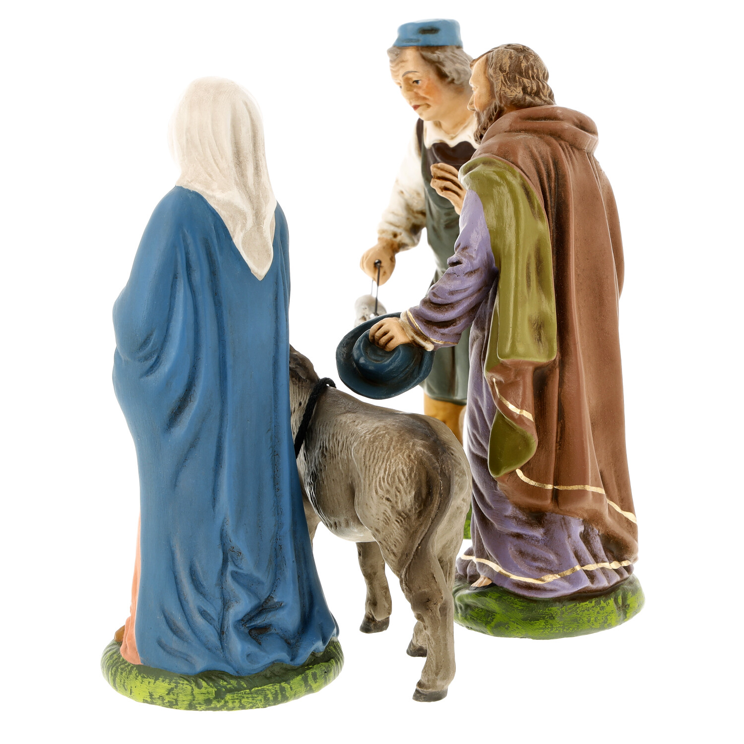 Drei Krippenfiguren mit Esel, detailreich bemalt