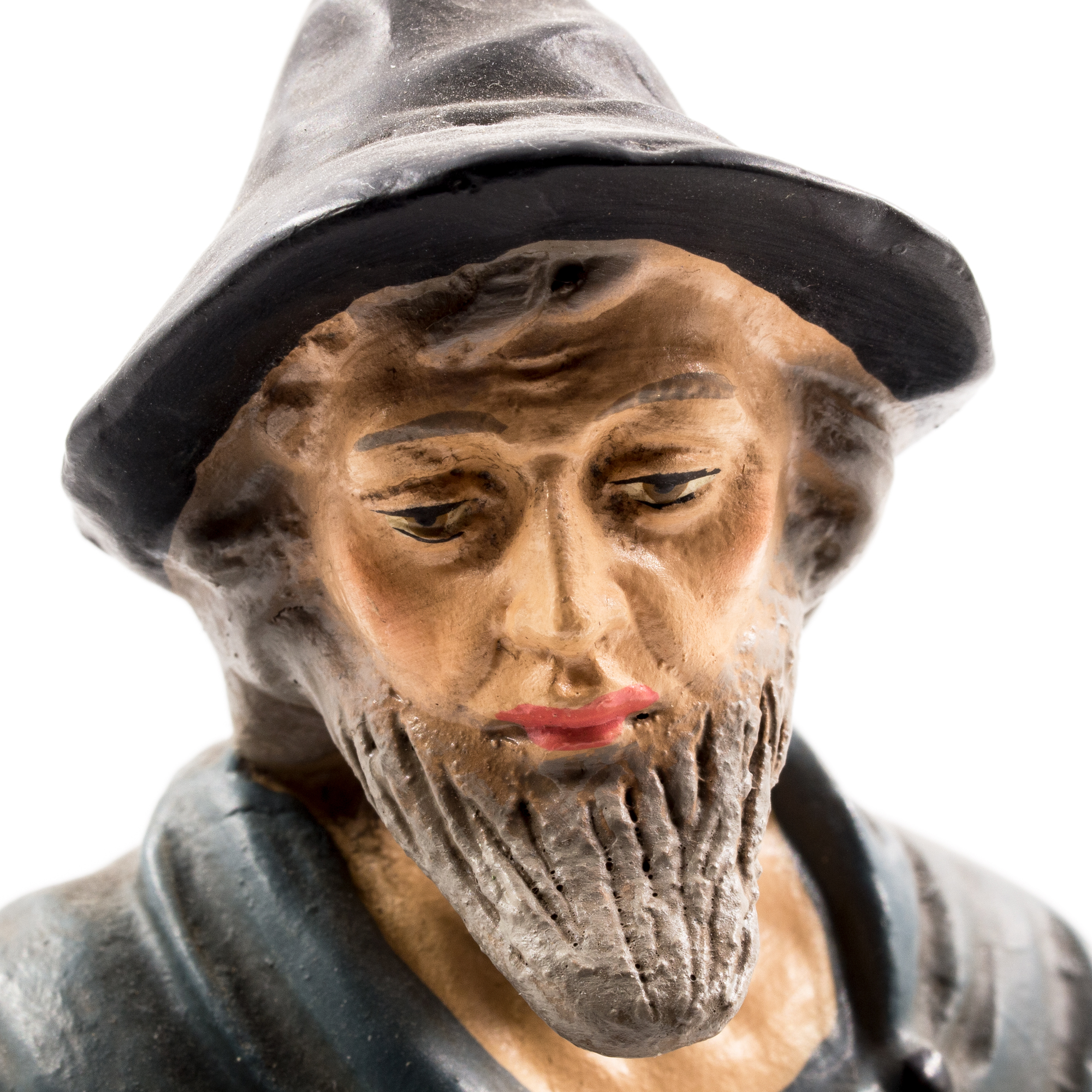 Detailfoto handbemalte Holzfigur mit Bart und Hut