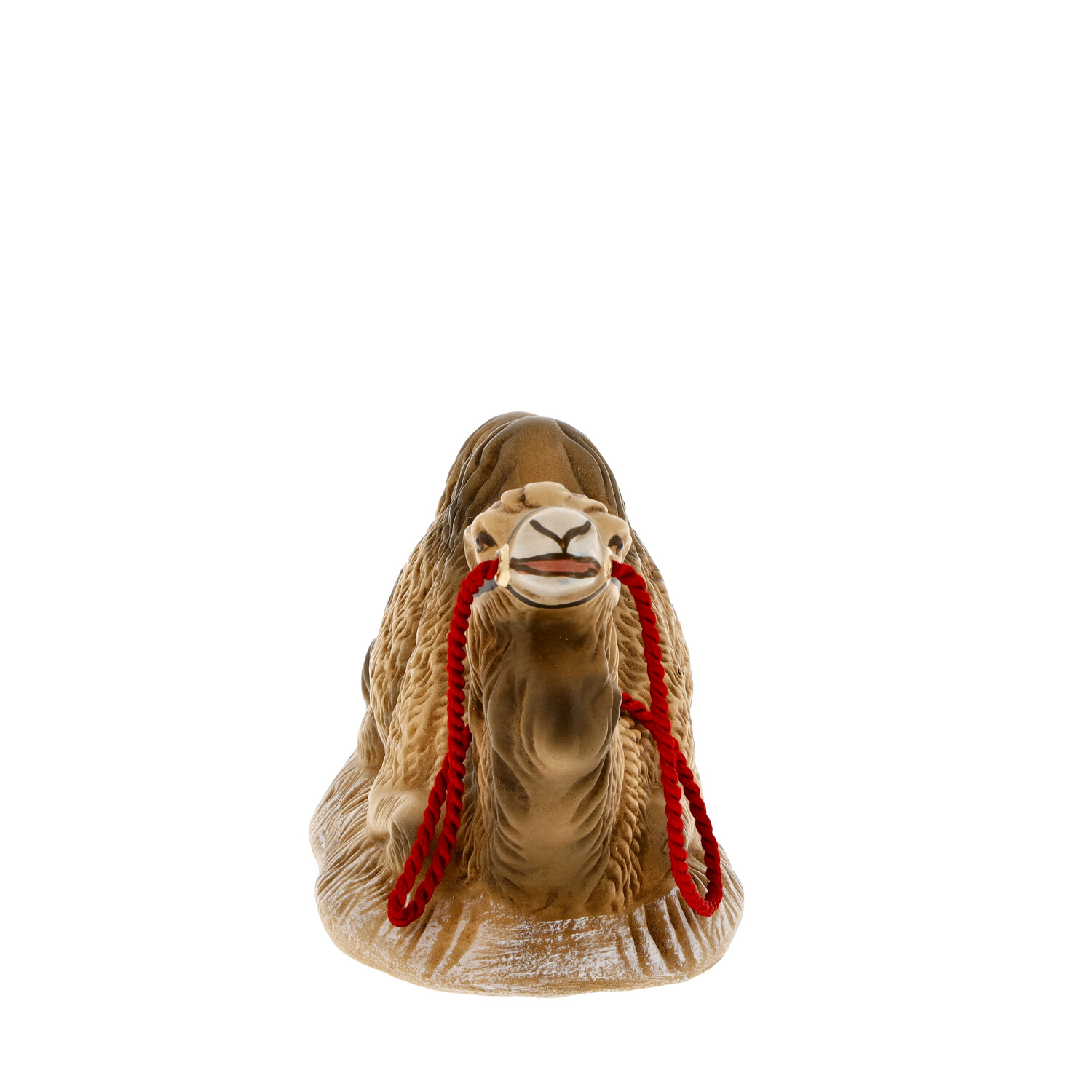 Liegende Kamelfigur mit rotem Halfter