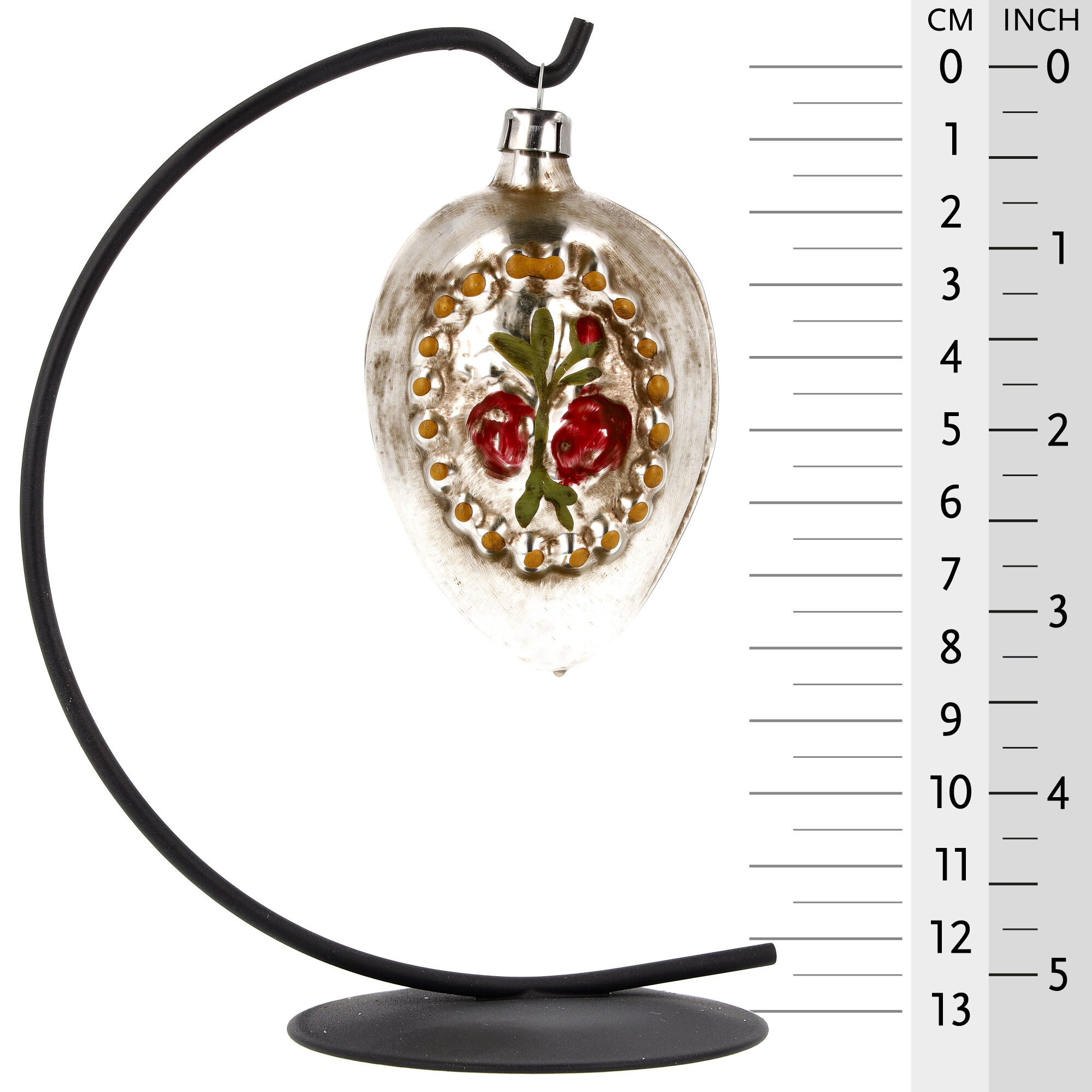 Silberner Glas-Christbaumschmuck mit roten Beeren